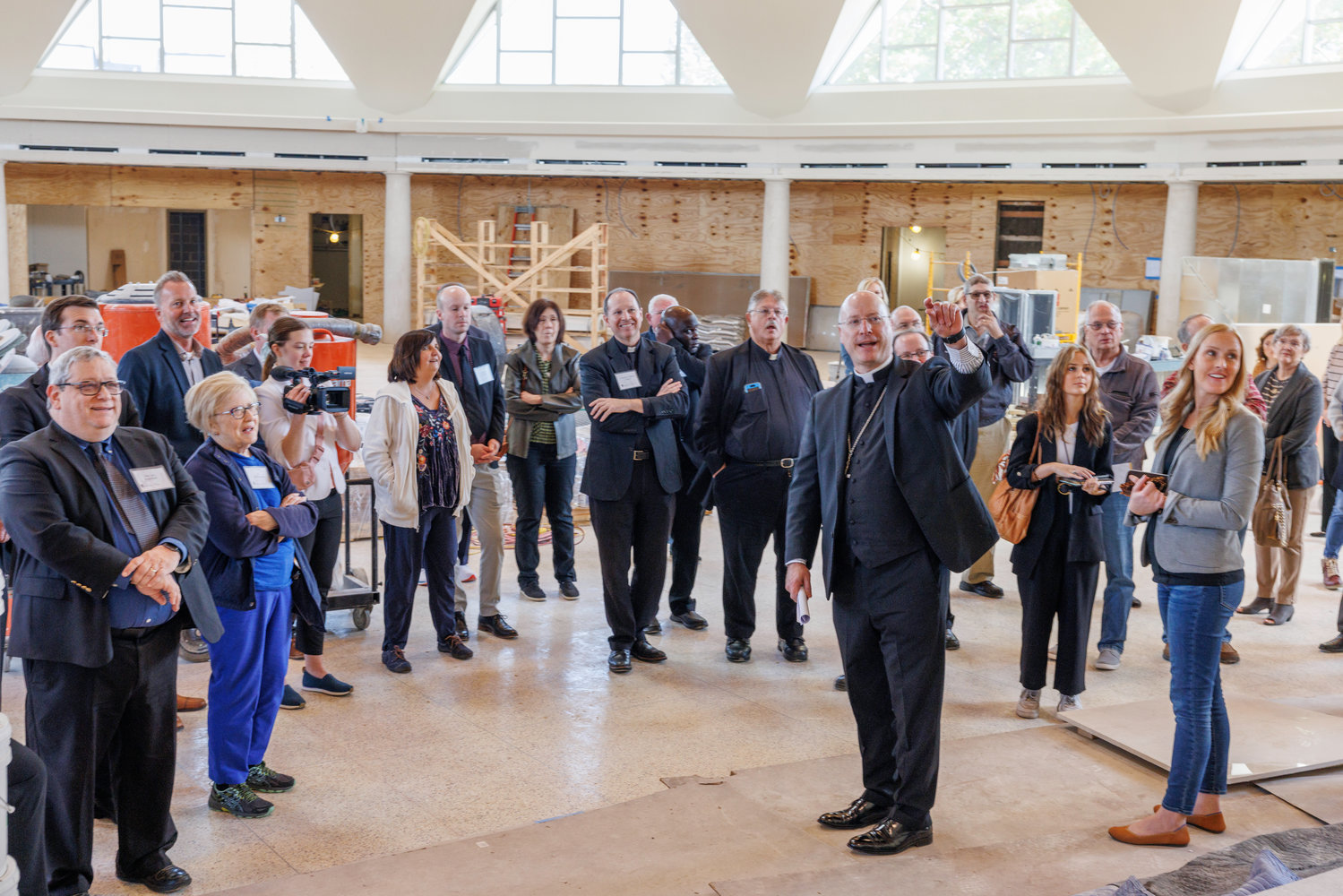 Bishop W. Shawn McKnight helps lead a handful of clergy, laypeople and media representatives on a tour of the Cathedral of St. Joseph, which is undergoing a substantial renovation and expansion.